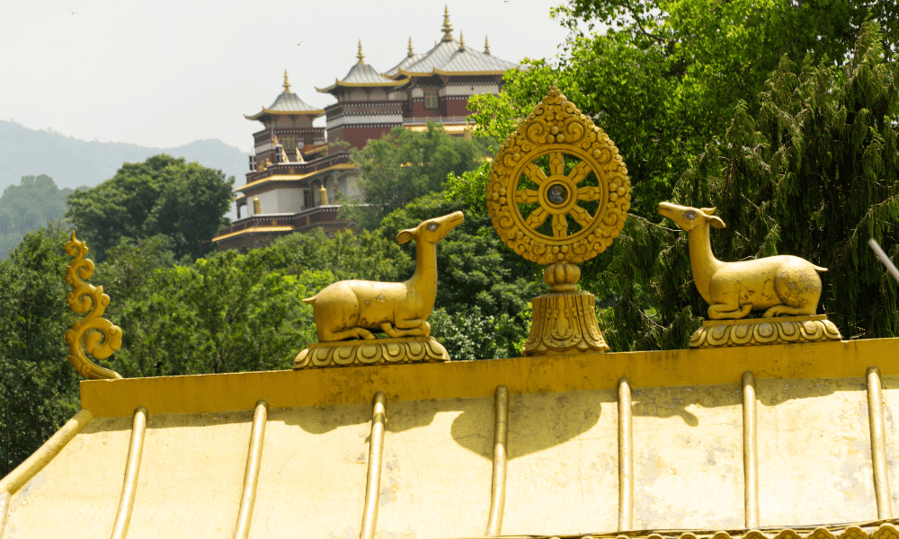 bronze deers on top of kopan monastery