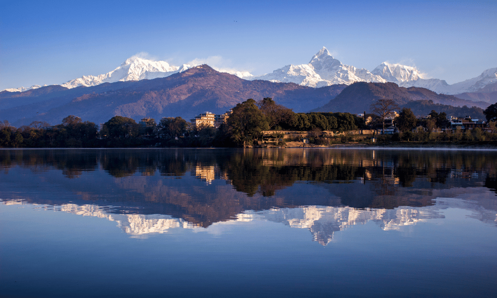 pokhara view, annapurna range on the background and fewa lake in the front