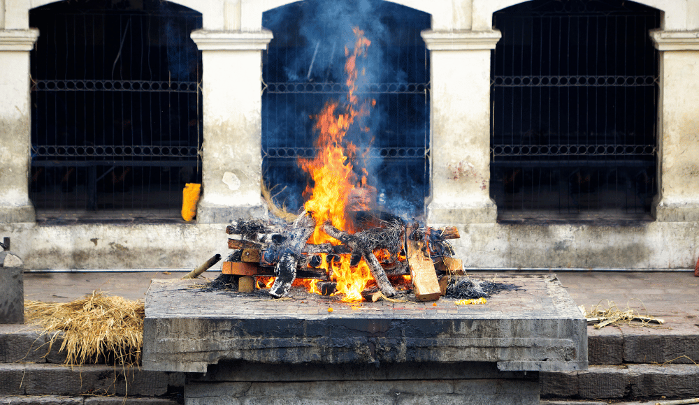 Burning wood, open air cremation