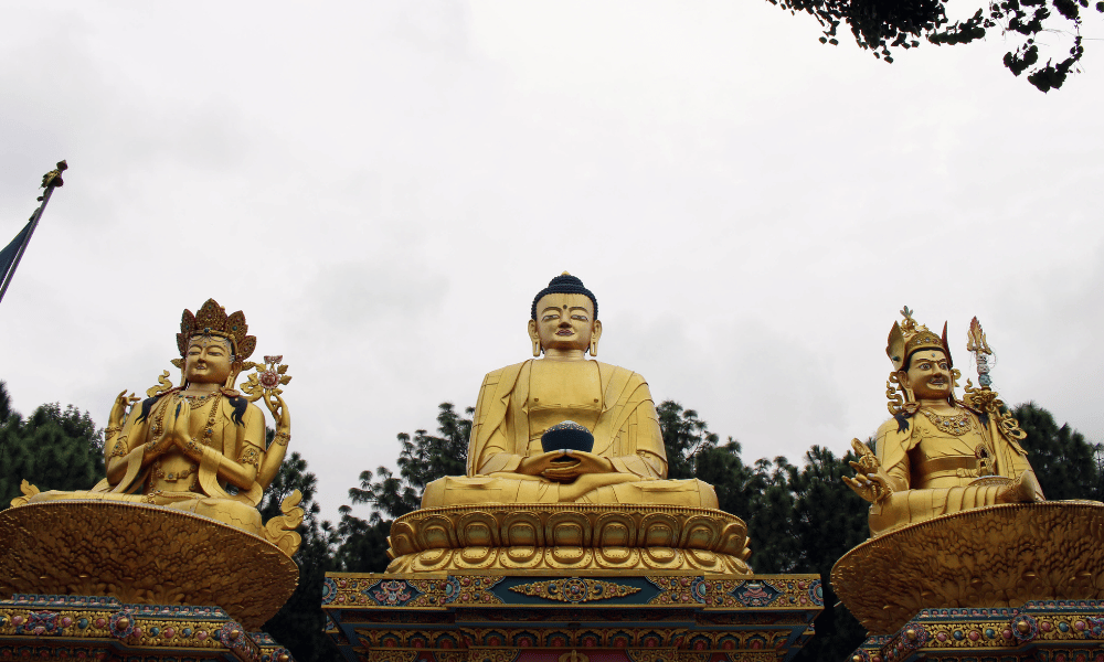 The three statues in Amideva Park, Swayambhu